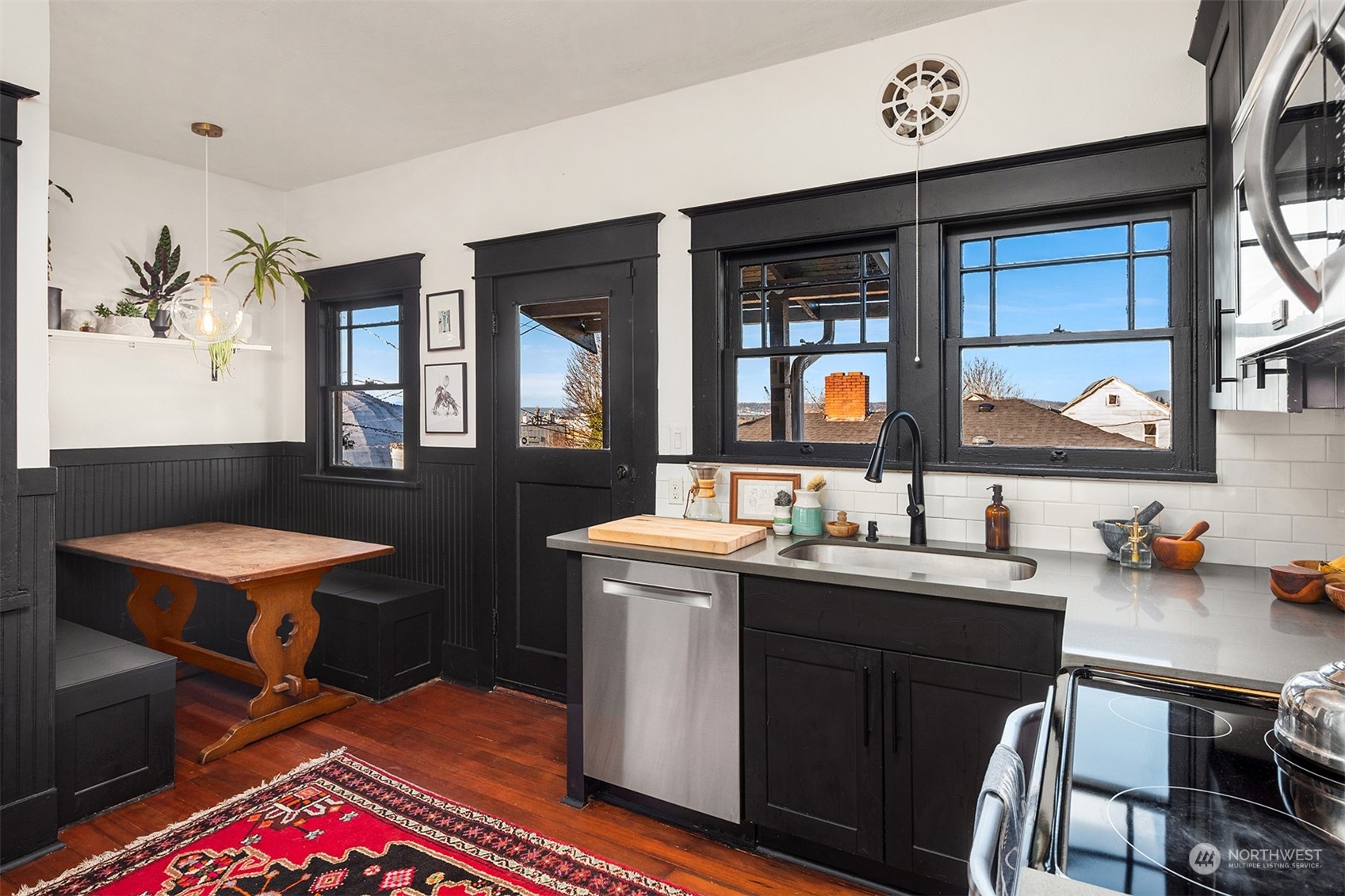 3009 Gedney Street Everett, WA 98201 - Photo 14 of 40 a view of a kitchen area with furniture and window