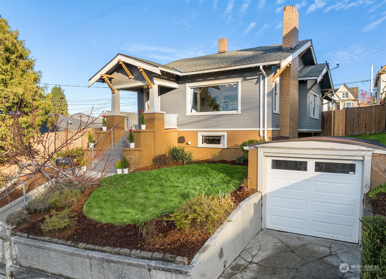 3009 Gedney Street Everett, WA 98201 - Photo 2 of 40 a front view of a house with a yard