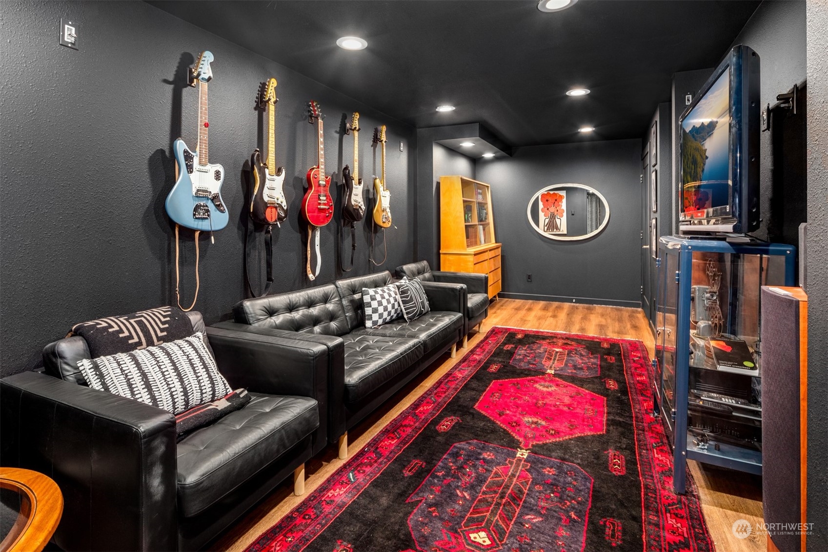 3009 Gedney Street Everett, WA 98201 - Photo 24 of 40 a living room with furniture and a flat screen tv