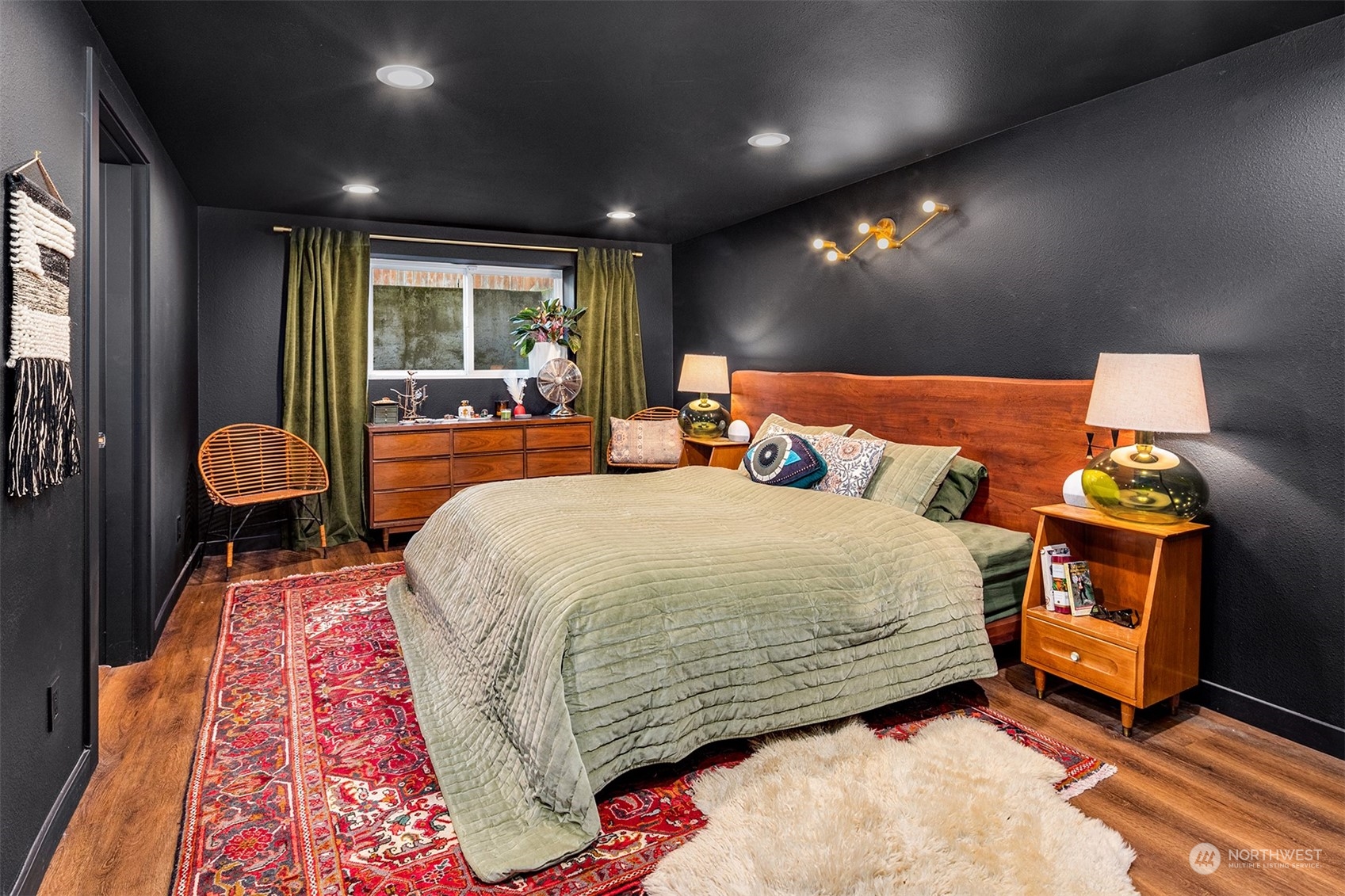 3009 Gedney Street Everett, WA 98201 - Photo 25 of 40 a bedroom with a bed and wooden floor