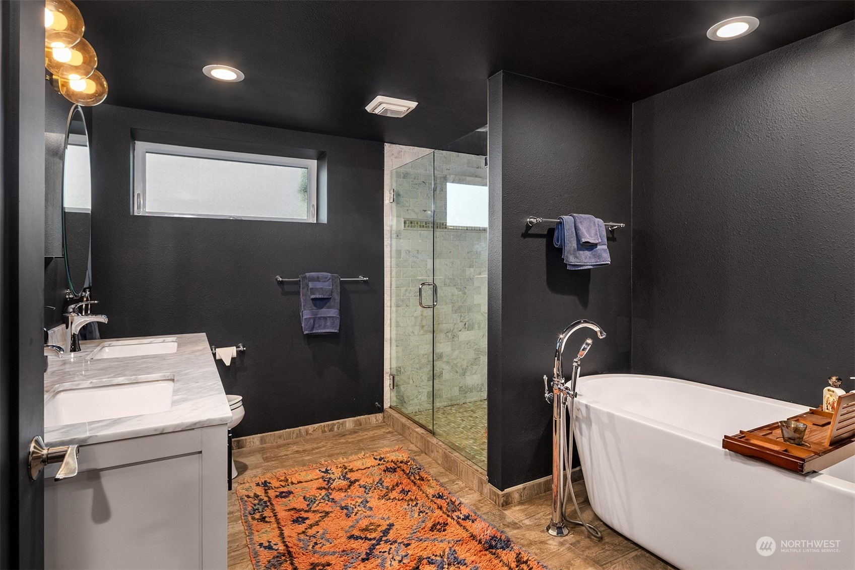 3009 Gedney Street Everett, WA 98201 - Photo 27 of 40 a bathroom with a sink toilet and shower