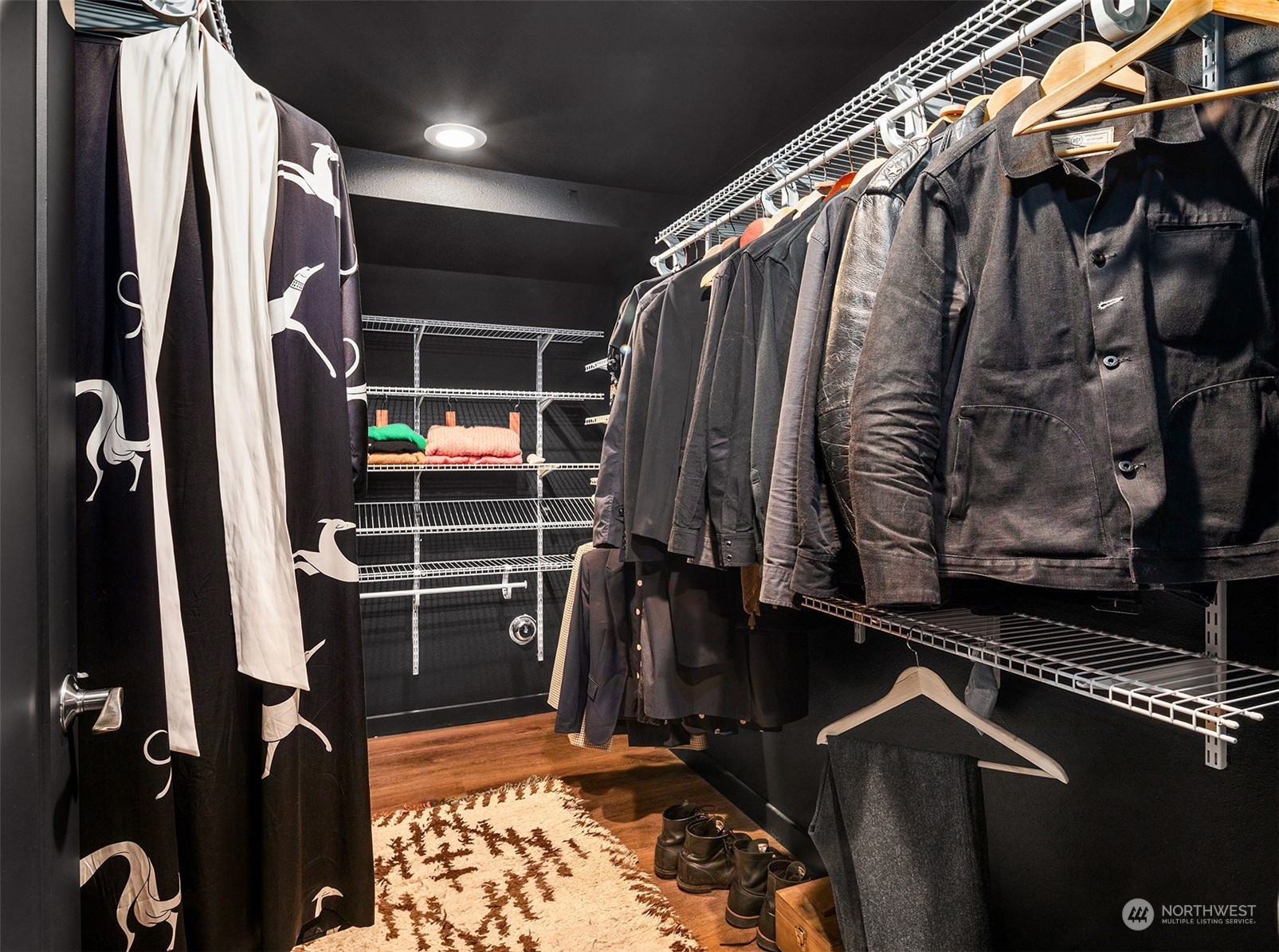 3009 Gedney Street Everett, WA 98201 - Photo 30 of 40 a view of walk in closet with clothes and shoes