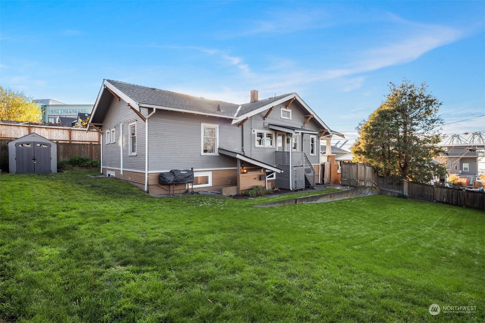 3009 Gedney Street Everett, WA 98201 - Photo 34 of 40 a view of a house with a big yard and large trees