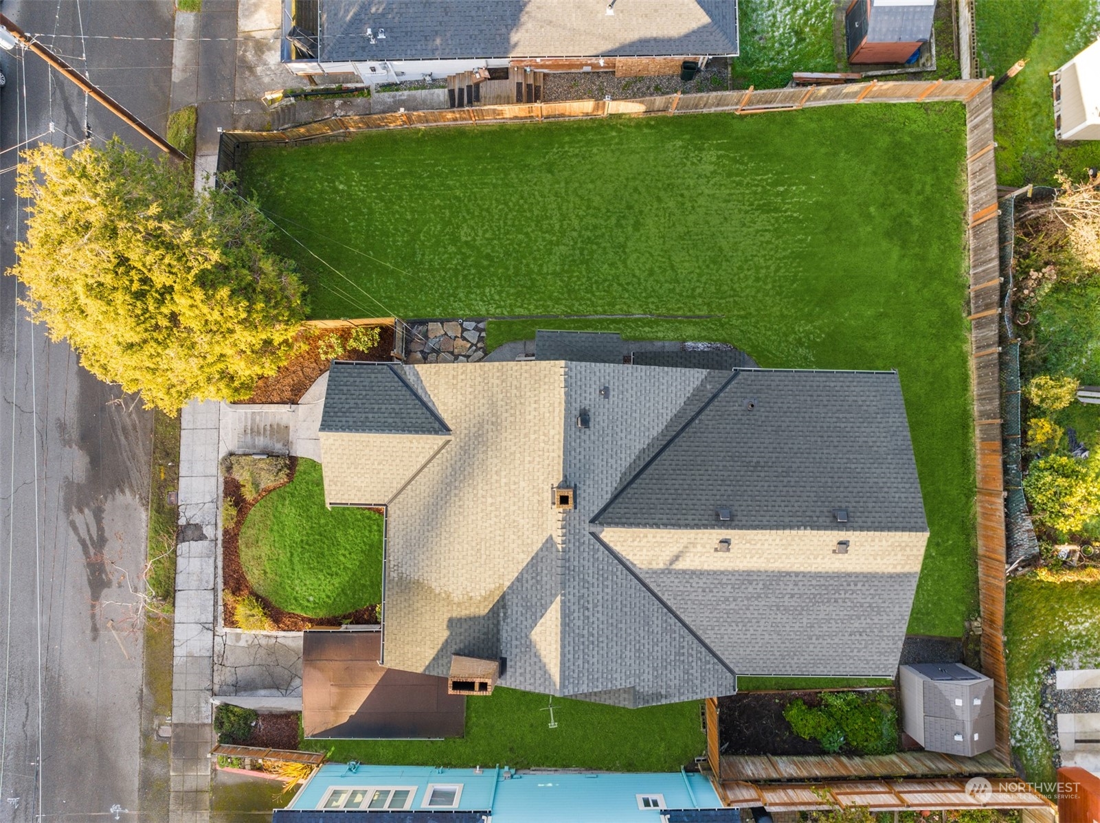 3009 Gedney Street Everett, WA 98201 - Photo 36 of 40 an aerial view of a house with a garden and a yard