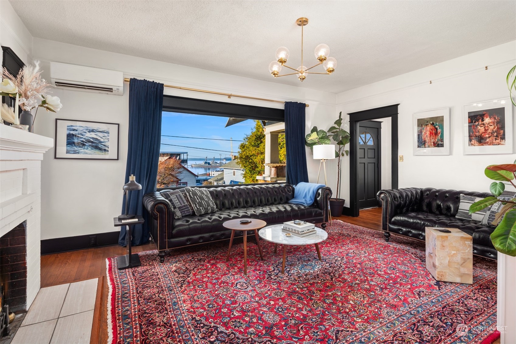 3009 Gedney Street Everett, WA 98201 - Photo 6 of 40 a living room with furniture a rug and a chandelier