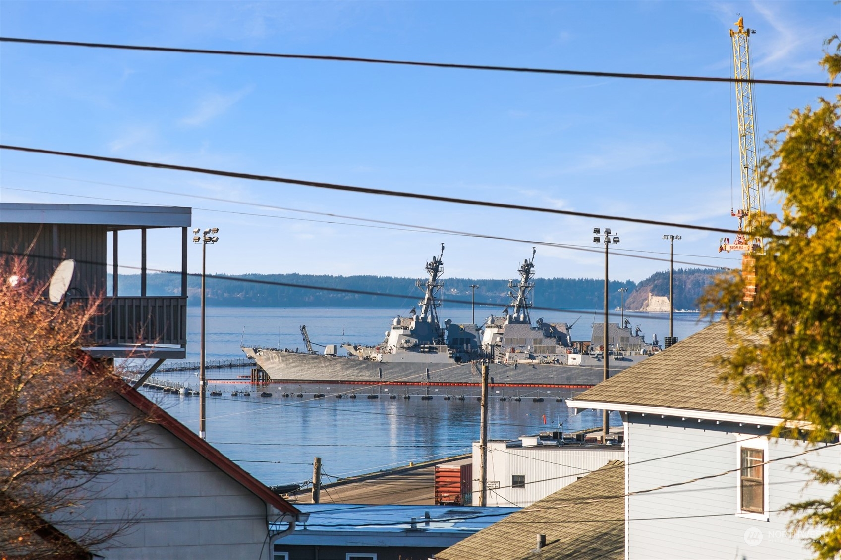 3009 Gedney Street Everett, WA 98201 - Photo 8 of 40 a view of a balcony with chairs and wooden floor