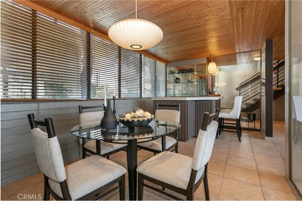 a kitchen with stainless steel appliances granite countertop a stove and a microwave