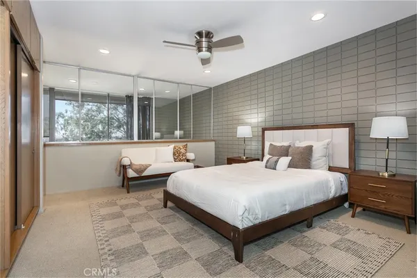 a work room with furniture and windows