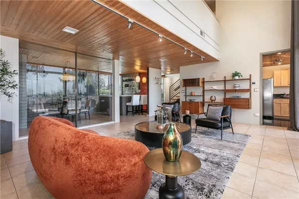 a outdoor living space with furniture and a potted plant