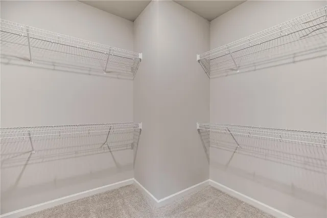 a view of a room with racks on the wall
