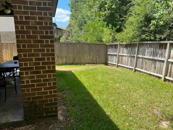 a bathroom with a sink and a shower