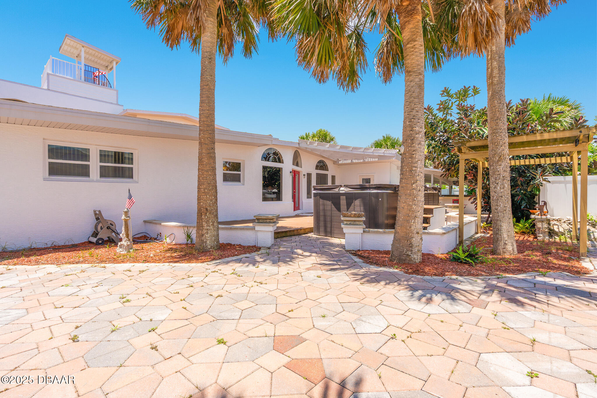 46 Oceanview Avenue Ponce Inlet, FL 32127 - Photo 55 of 79 a view of a yard with a house in the background