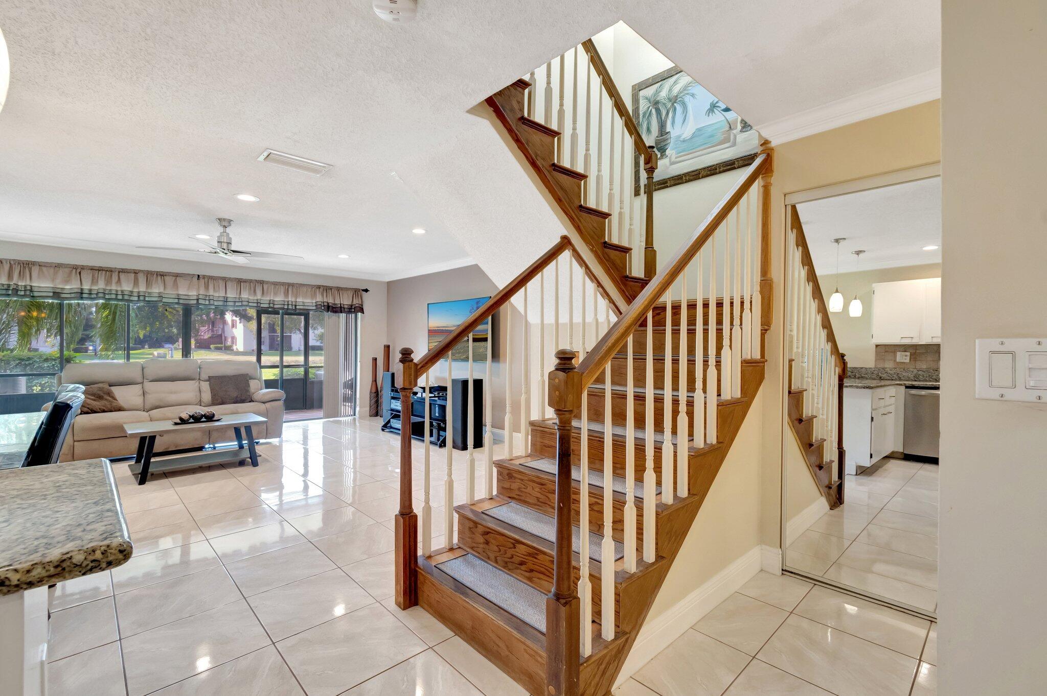 23359 Southwest 55th Way, Unit G Boca Raton, FL 33433 - Photo 13 of 63 Wood Laminate Stairs