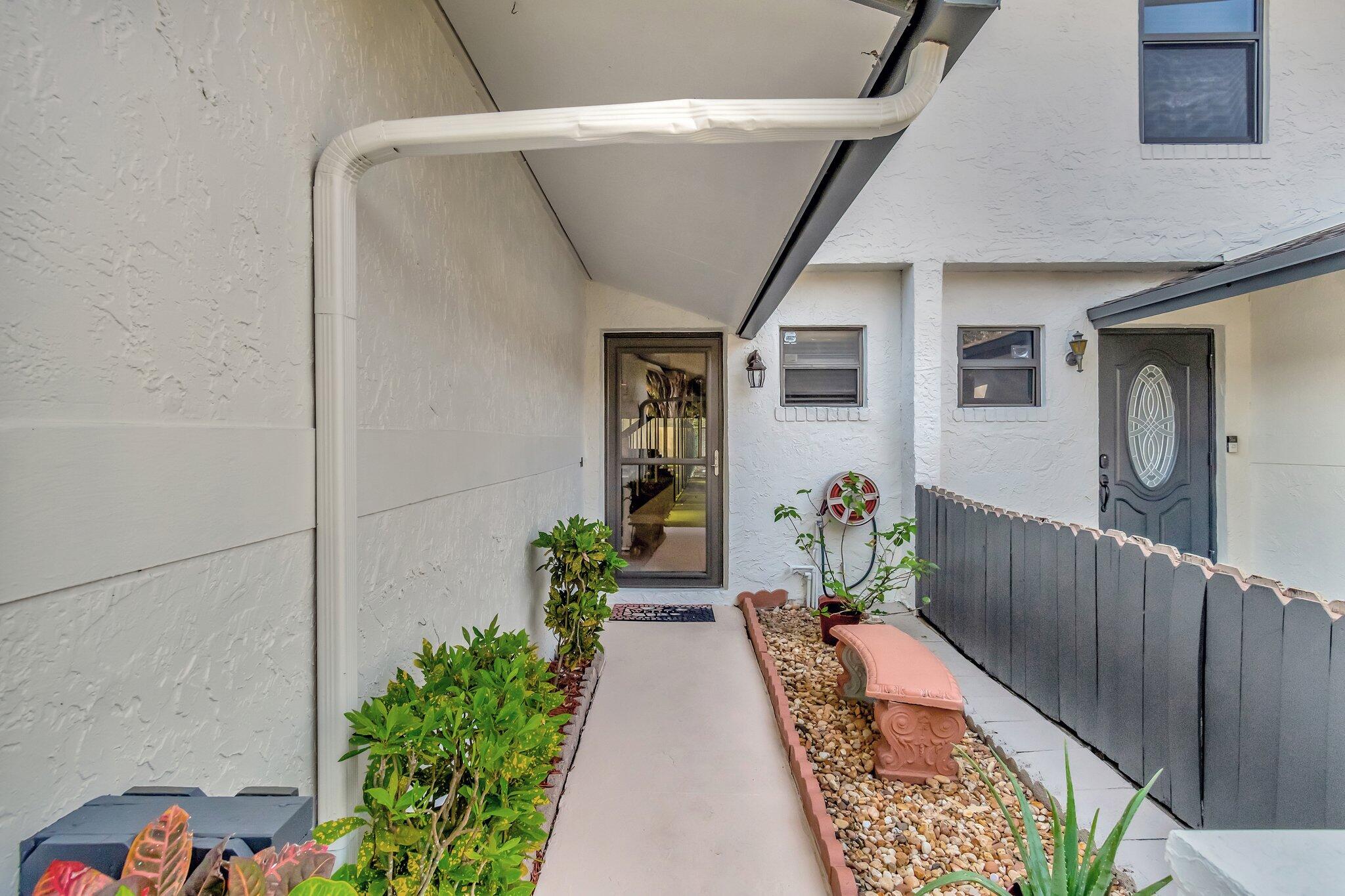 23359 Southwest 55th Way, Unit G Boca Raton, FL 33433 - Photo 42 of 63 Covered Walkway