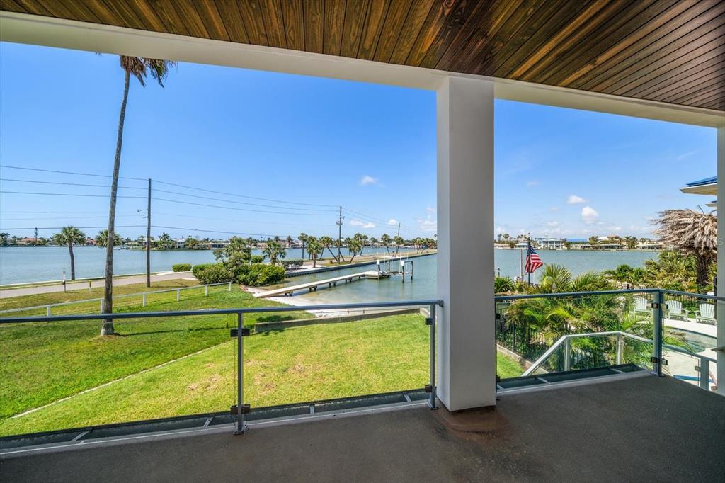 16047 Redington Drive Redington Beach, FL 33708 - Photo 35 of 80 a view of a balcony with chairs