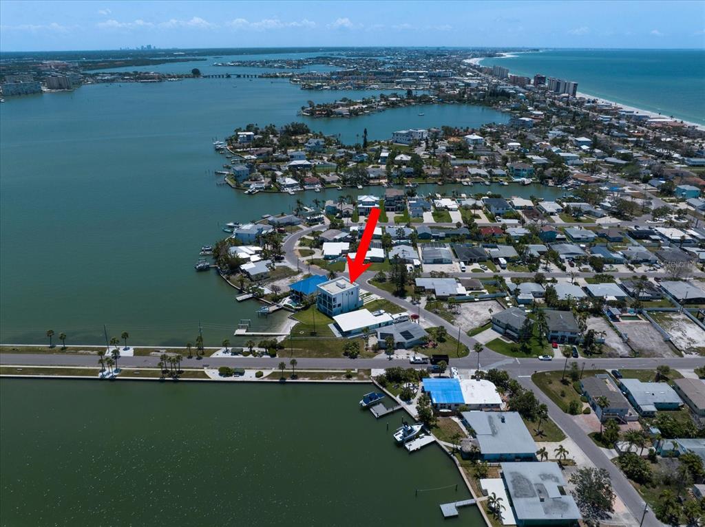 16047 Redington Drive Redington Beach, FL 33708 - Photo 6 of 80 an aerial view of a city with ocean view