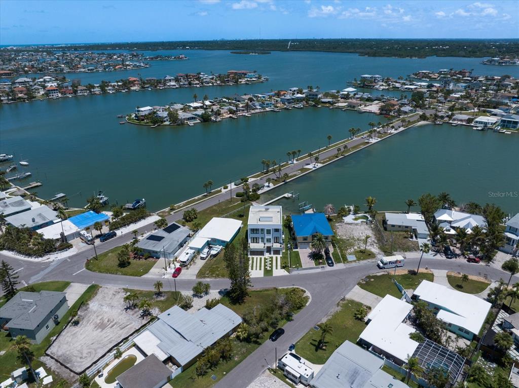 16047 Redington Drive Redington Beach, FL 33708 - Photo 75 of 80 an aerial view of a house with a lake view