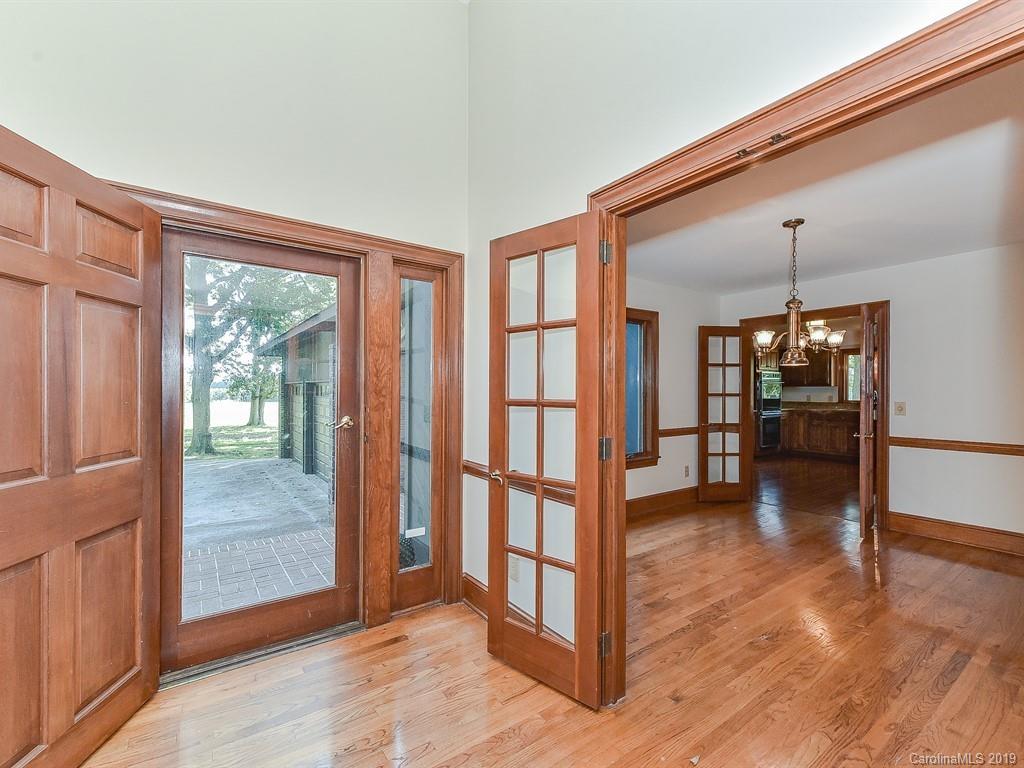 402 3 Knotts Road Monroe, NC 28112 - Photo 3 of 48 a view of a room window and wooden floor