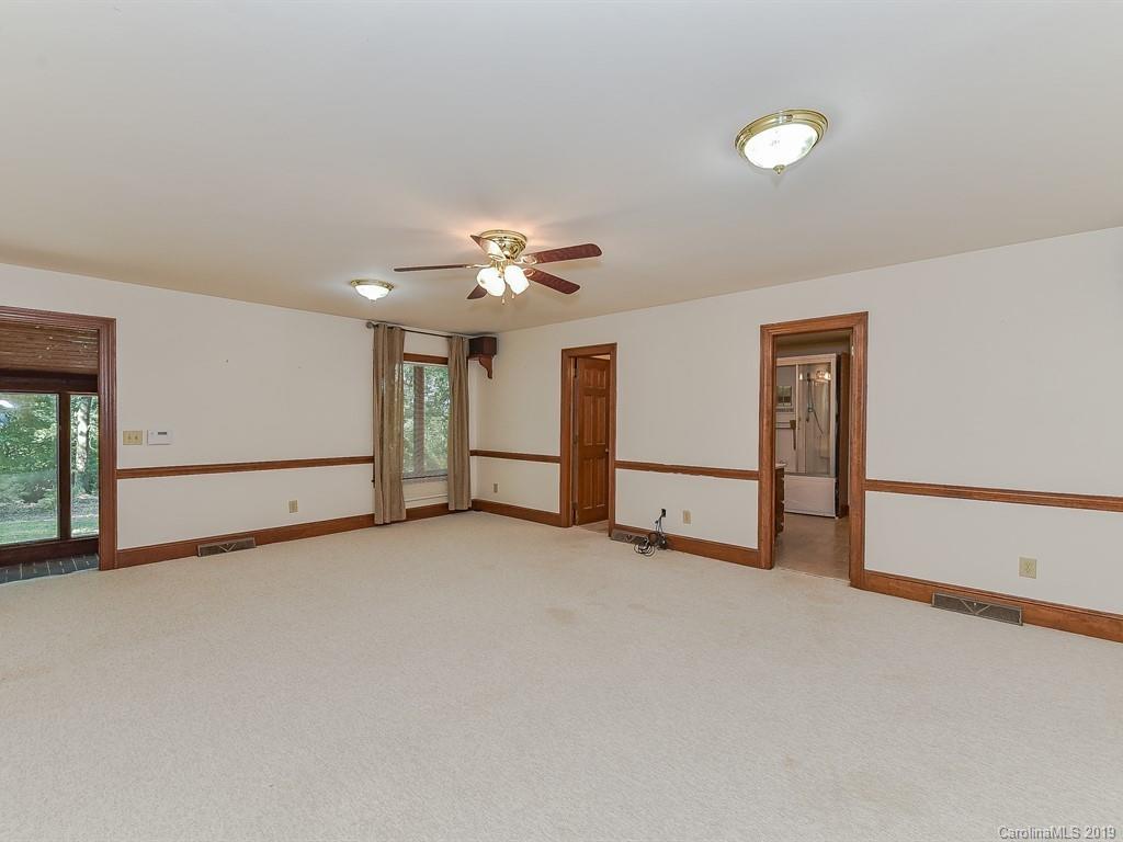 402 3 Knotts Road Monroe, NC 28112 - Photo 29 of 48 an empty room with windows