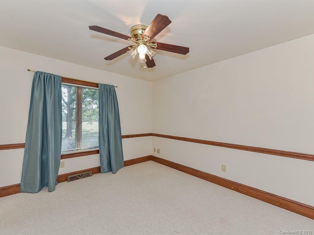 402 3 Knotts Road Monroe, NC 28112 - Photo 36 of 48 a view of an empty room with a window