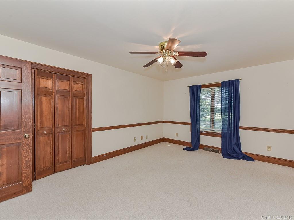 402 3 Knotts Road Monroe, NC 28112 - Photo 39 of 48 a view of empty room with ceiling fan