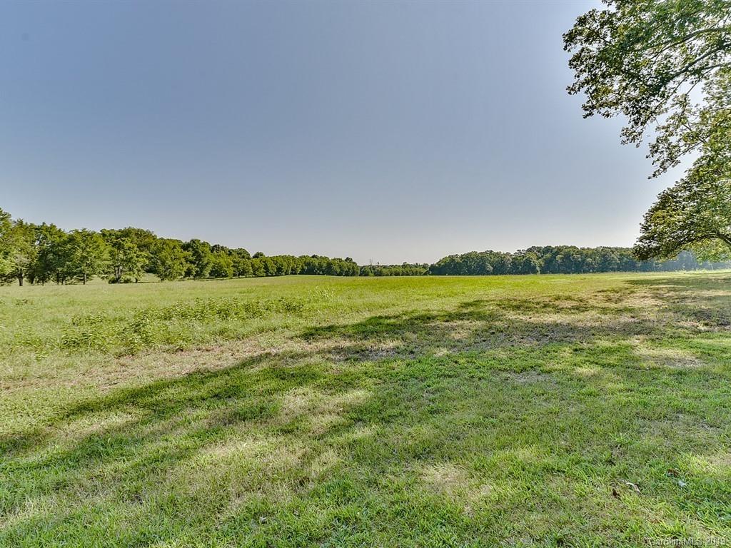 402 3 Knotts Road Monroe, NC 28112 - Photo 45 of 48 a view of a field with an ocean view