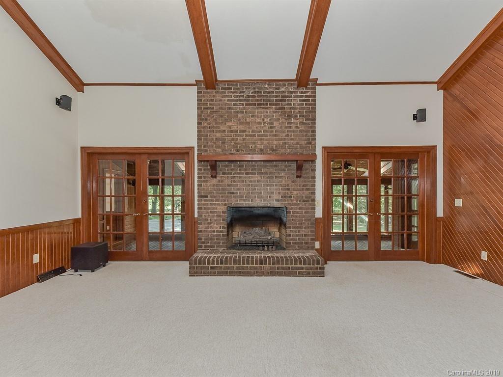 402 3 Knotts Road Monroe, NC 28112 - Photo 9 of 48 a living room with furniture window and fireplace