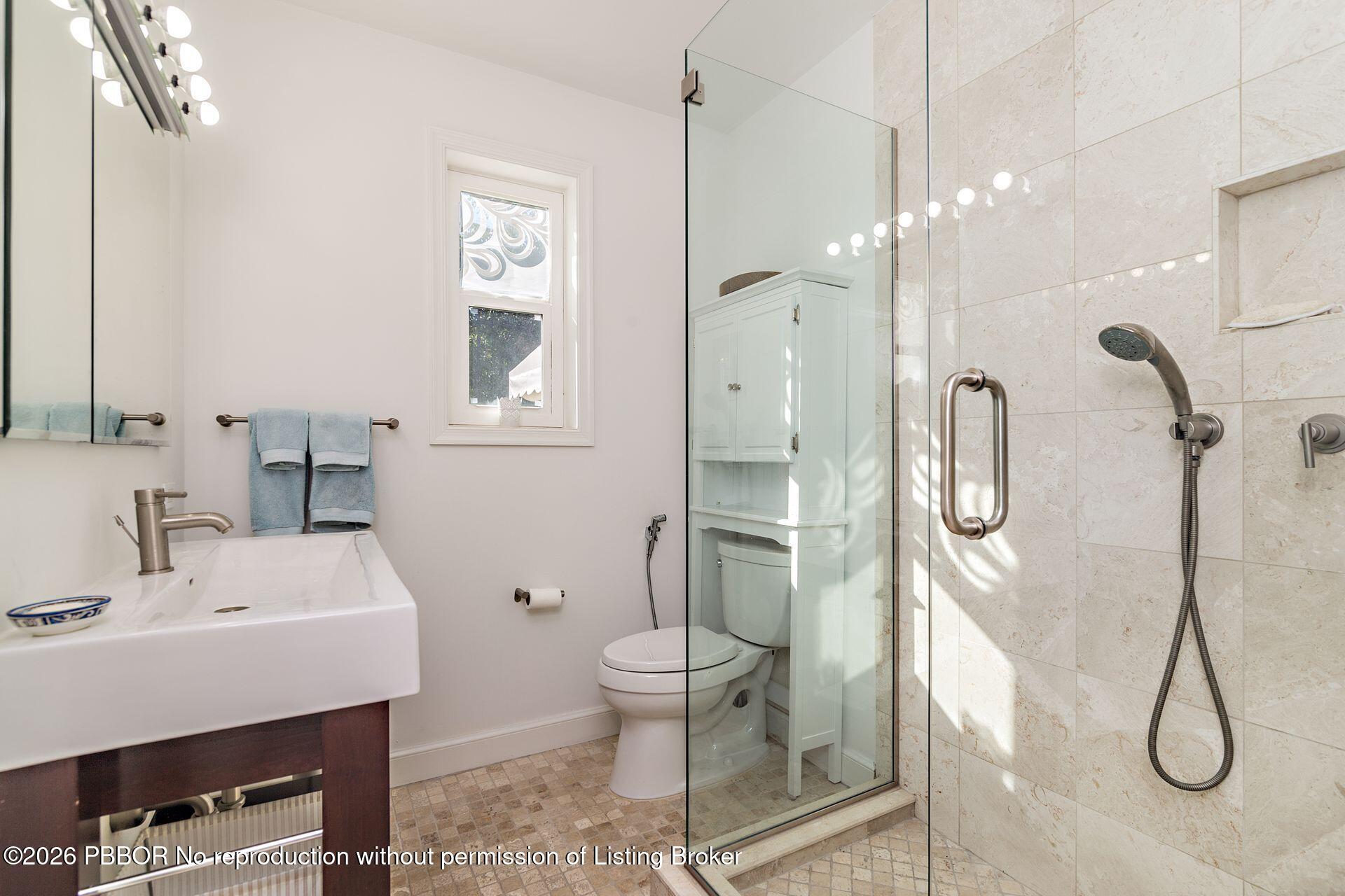 224 Churchill Road West Palm Beach, FL 33405 - Photo 17 of 33 a bathroom with a sink toilet and shower