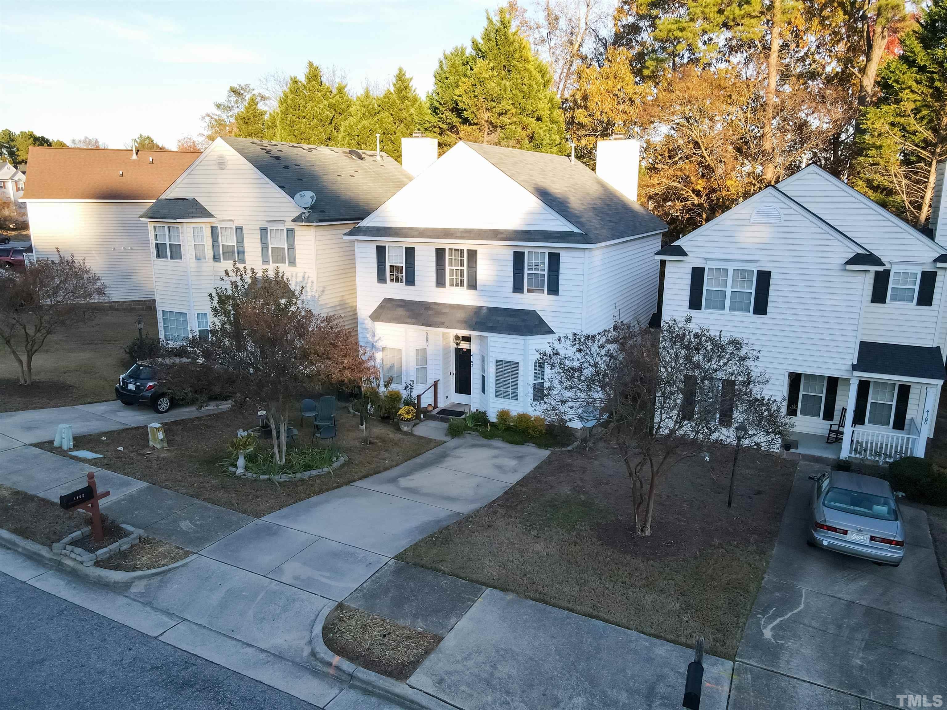 4102 Beaufain Street Raleigh, NC 27604 - Photo 2 of 28 a front view of a house with a yard
