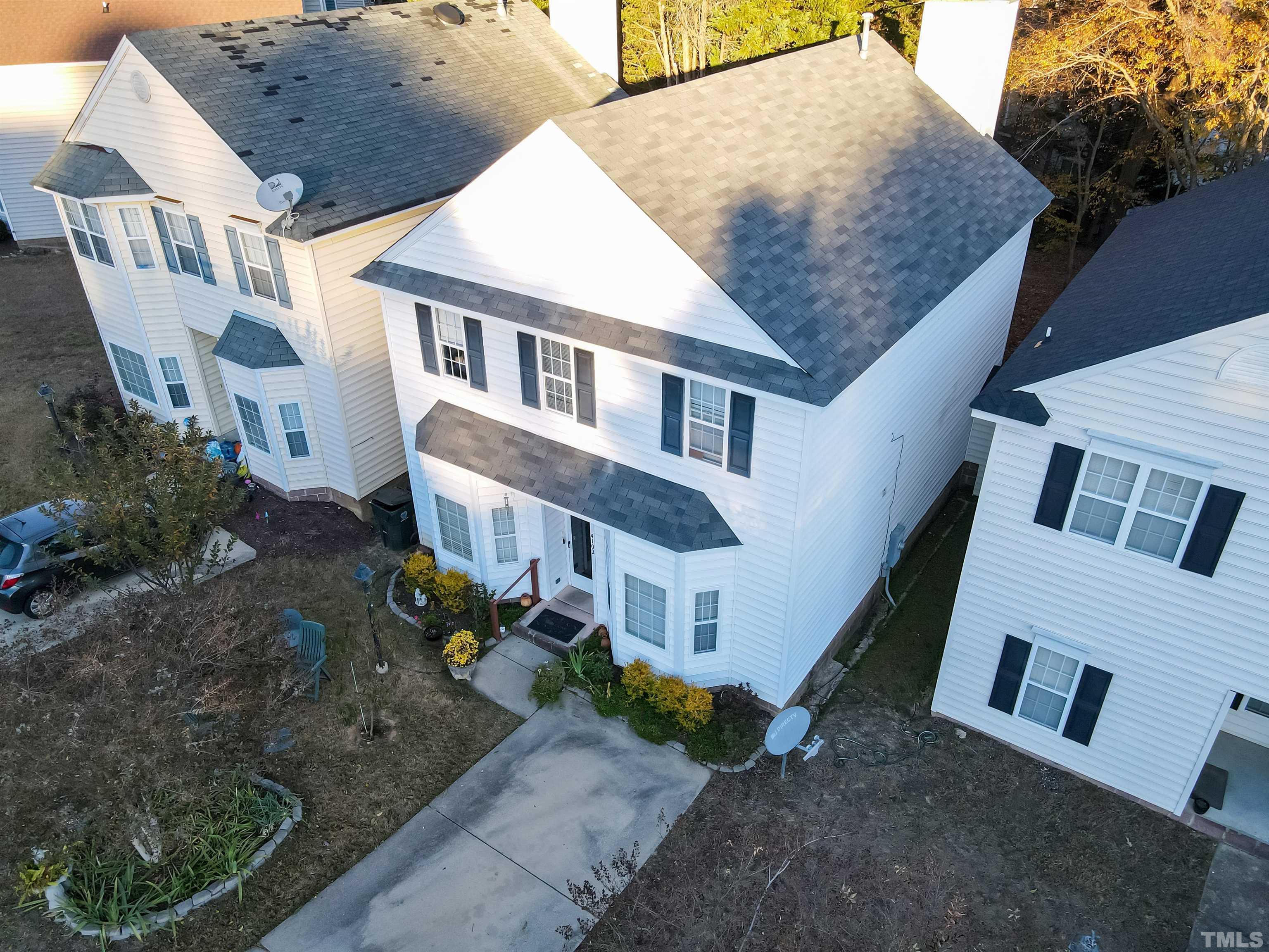 4102 Beaufain Street Raleigh, NC 27604 - Photo 4 of 28 a front view of a house with a yard