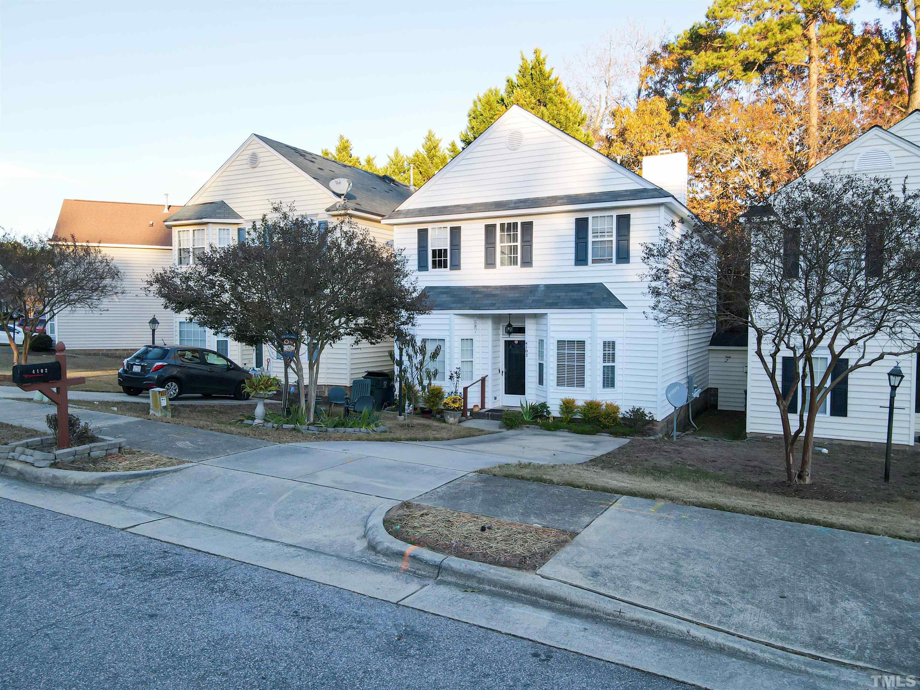 4102 Beaufain Street Raleigh, NC 27604 - Photo 7 of 28 a front view of a house with a yard