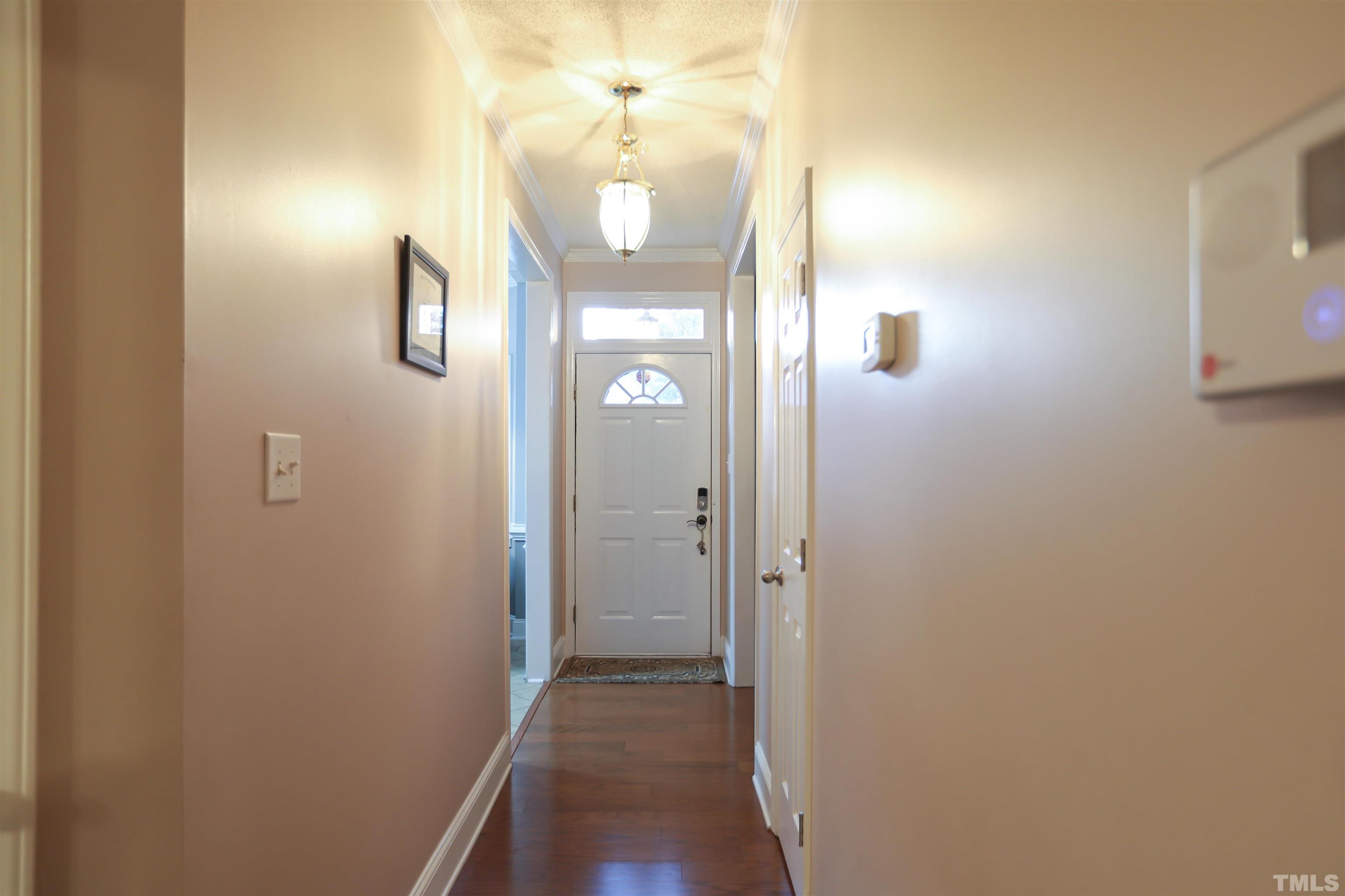 4102 Beaufain Street Raleigh, NC 27604 - Photo 9 of 28 a view of a bathroom from a hallway