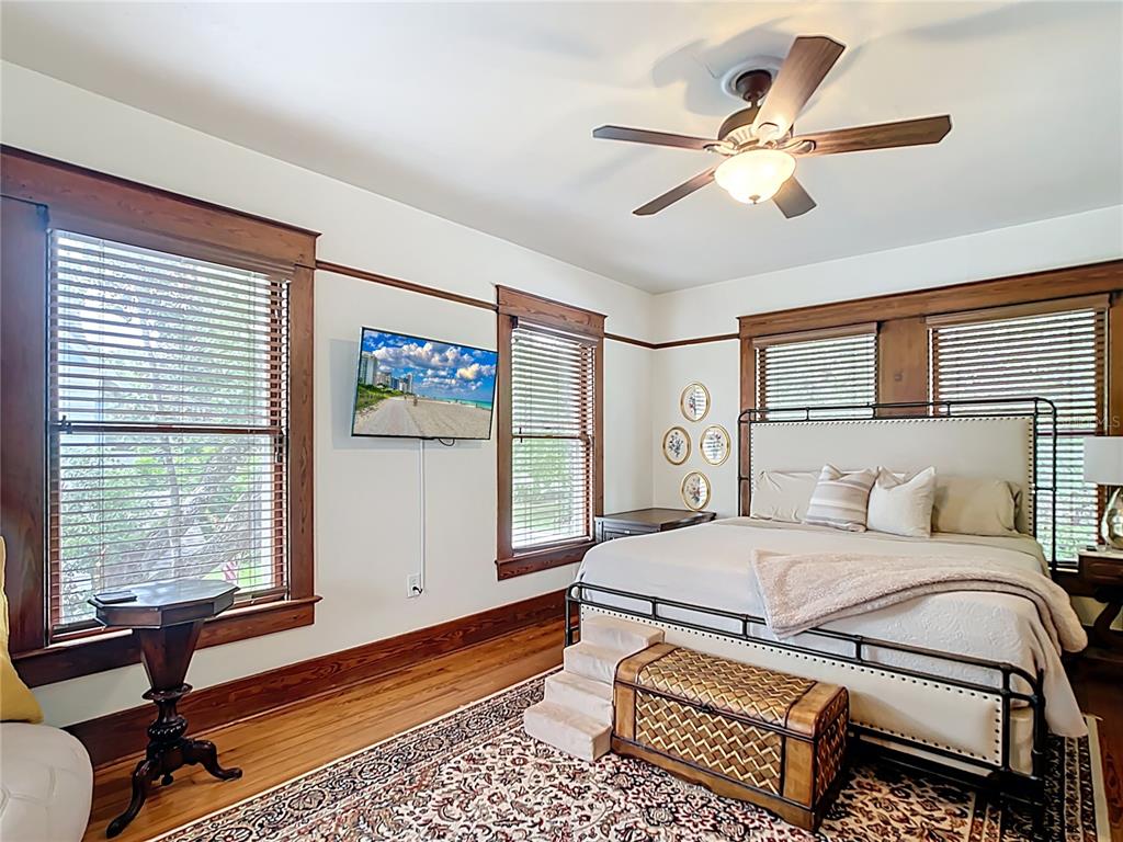705 Southeast 5th Street Ocala, FL 34471 - Photo 20 of 41 a bedroom with a large bed and a window
