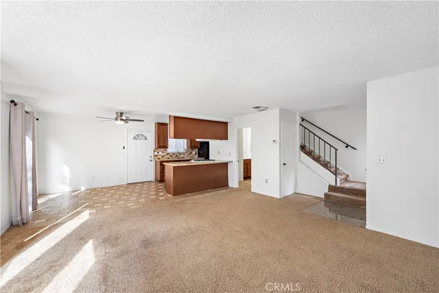 a view of kitchen with furniture and cabinet