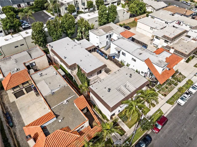 an aerial view of a house with a ocean view