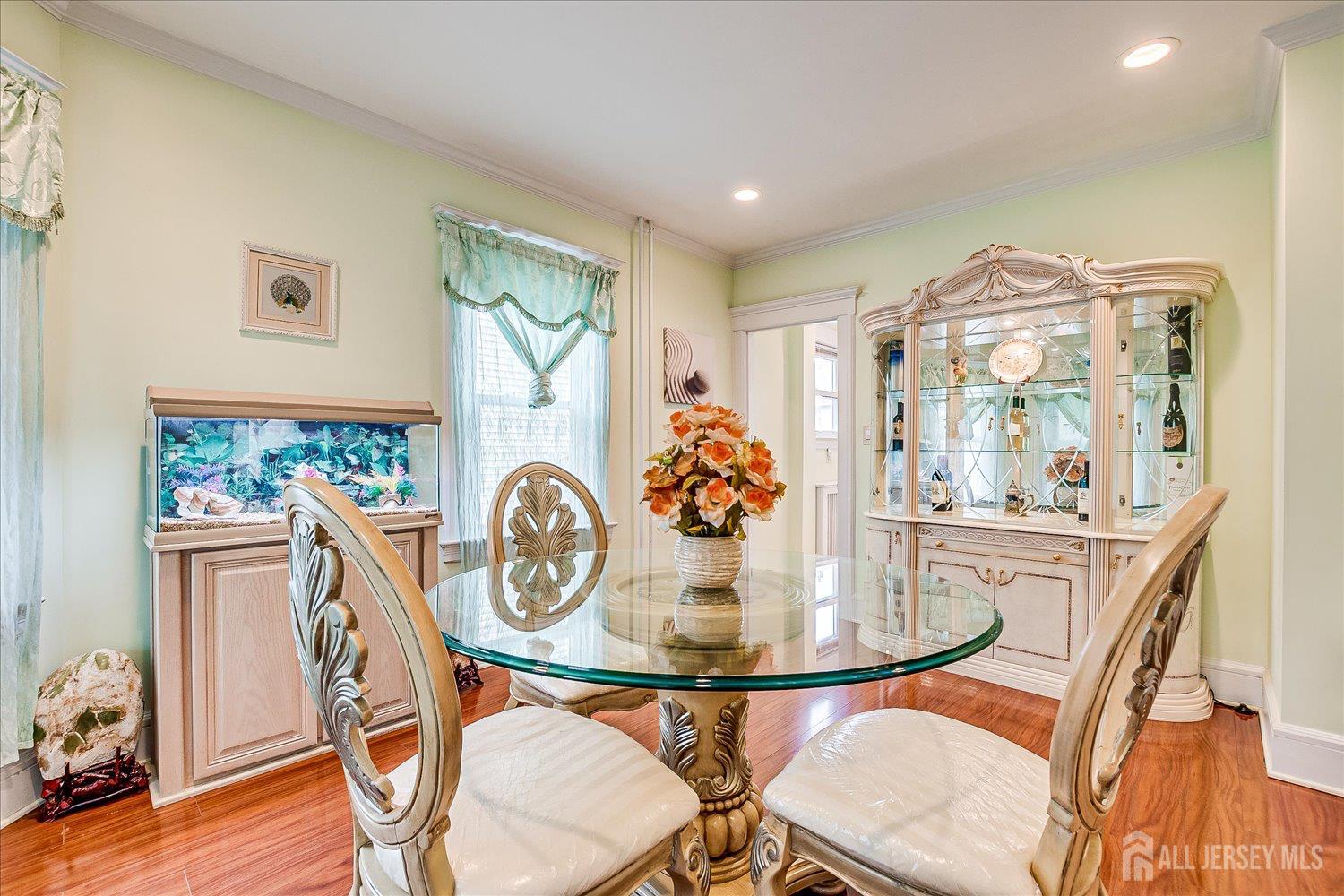311 Prospect Avenue Dunellen, NJ 08812 - Photo 11 of 42 a view of a dining room with furniture window and wooden floor