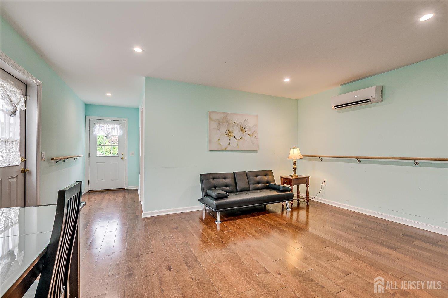 311 Prospect Avenue Dunellen, NJ 08812 - Photo 18 of 42 a living room with furniture and wooden floor