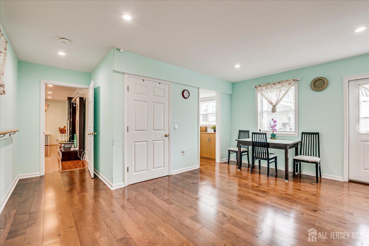 311 Prospect Avenue Dunellen, NJ 08812 - Photo 20 of 42 a view of a dining area with furniture and wooden floor