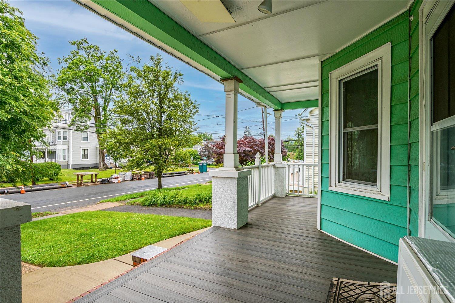 311 Prospect Avenue Dunellen, NJ 08812 - Photo 3 of 42 a view of a porch with a garden