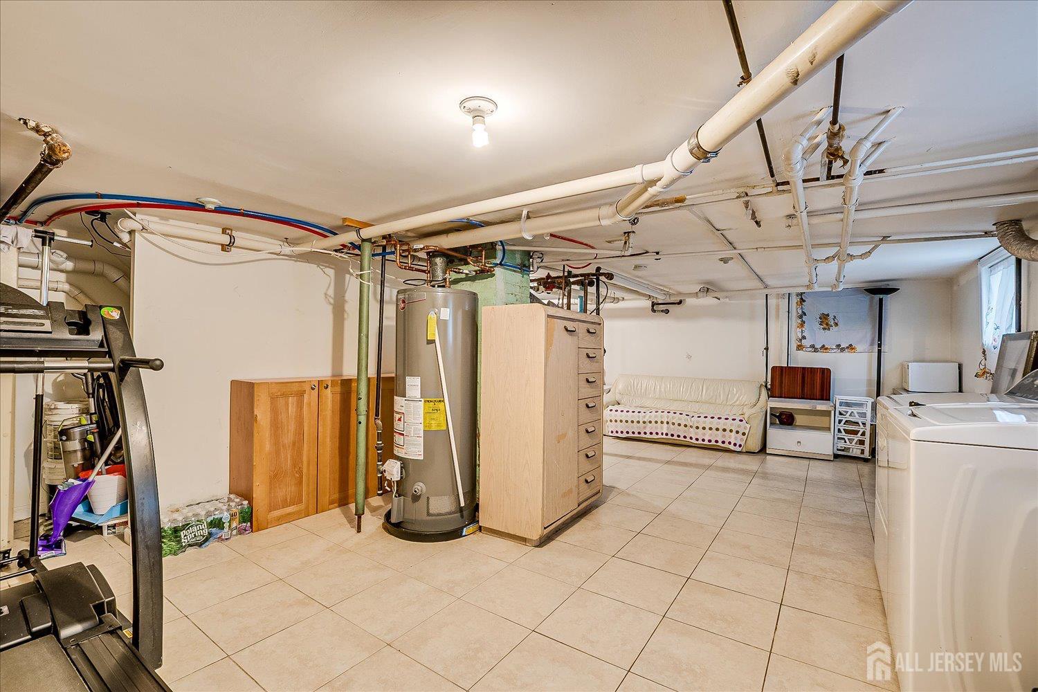 311 Prospect Avenue Dunellen, NJ 08812 - Photo 42 of 42 a view of a room with lots of gym equipment