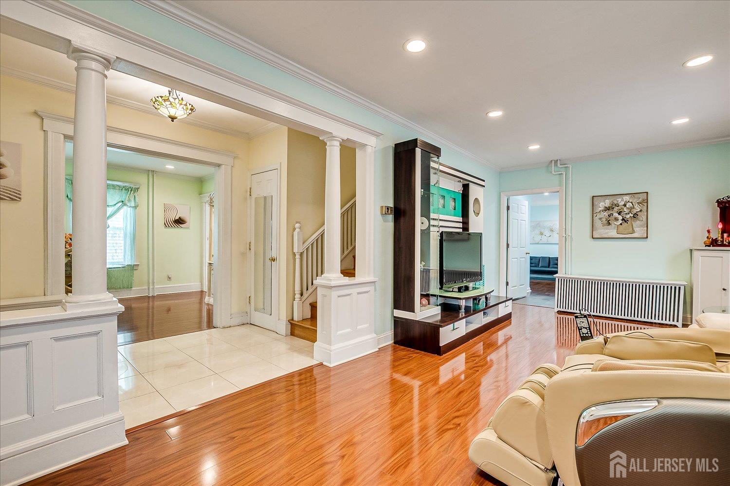 311 Prospect Avenue Dunellen, NJ 08812 - Photo 6 of 42 a bedroom with a large bed and a large window