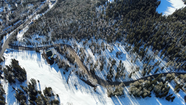6 Tushar Mountain Estates, Unit 6 Beaver, UT 84713 - Photo 15 of 16 Expansive wooded landscape with snow-covered terrain