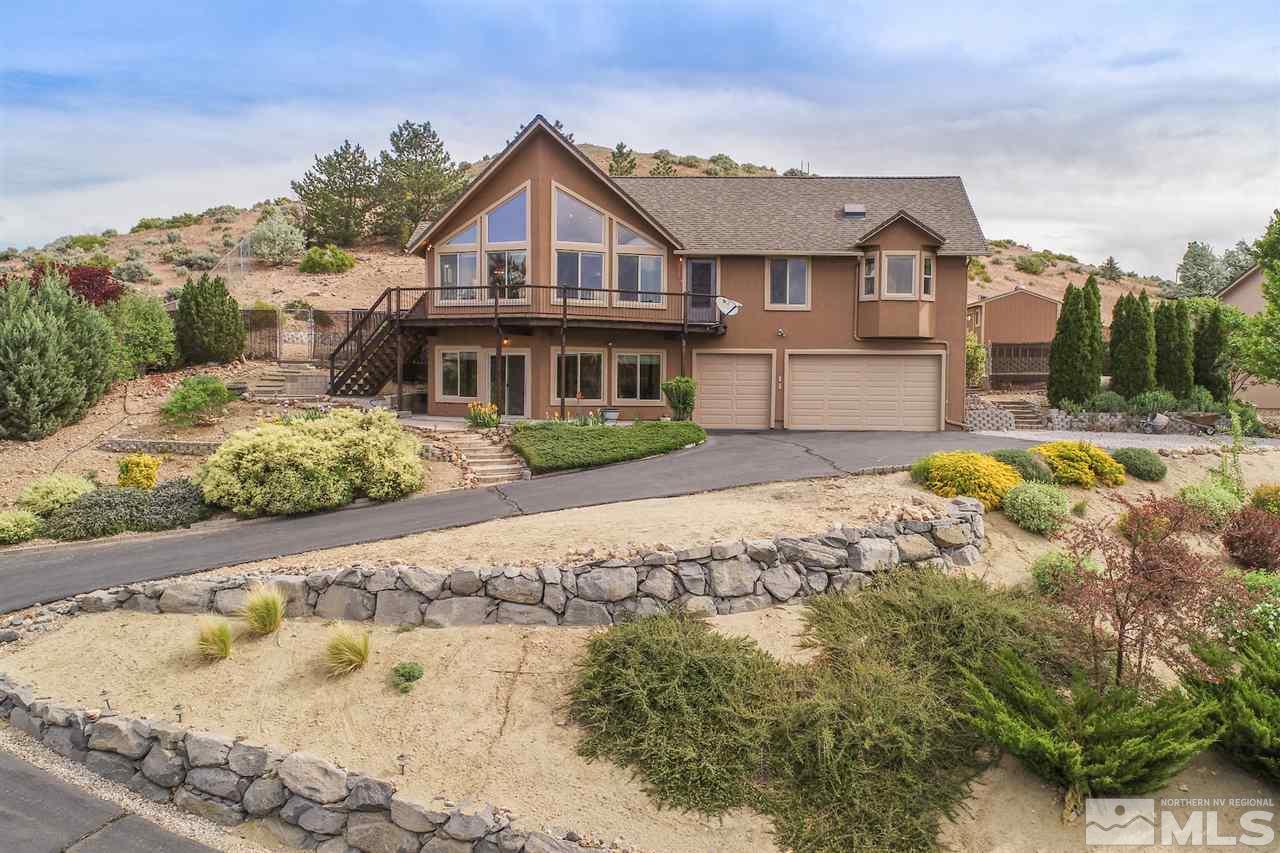 15505 Minnetonka Circle Reno, NV 89521 - Photo 1 of 25 a front view of a house with a yard