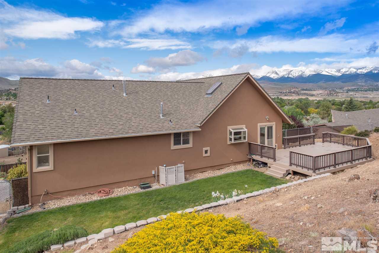 15505 Minnetonka Circle Reno, NV 89521 - Photo 17 of 25 a view of a house with a yard