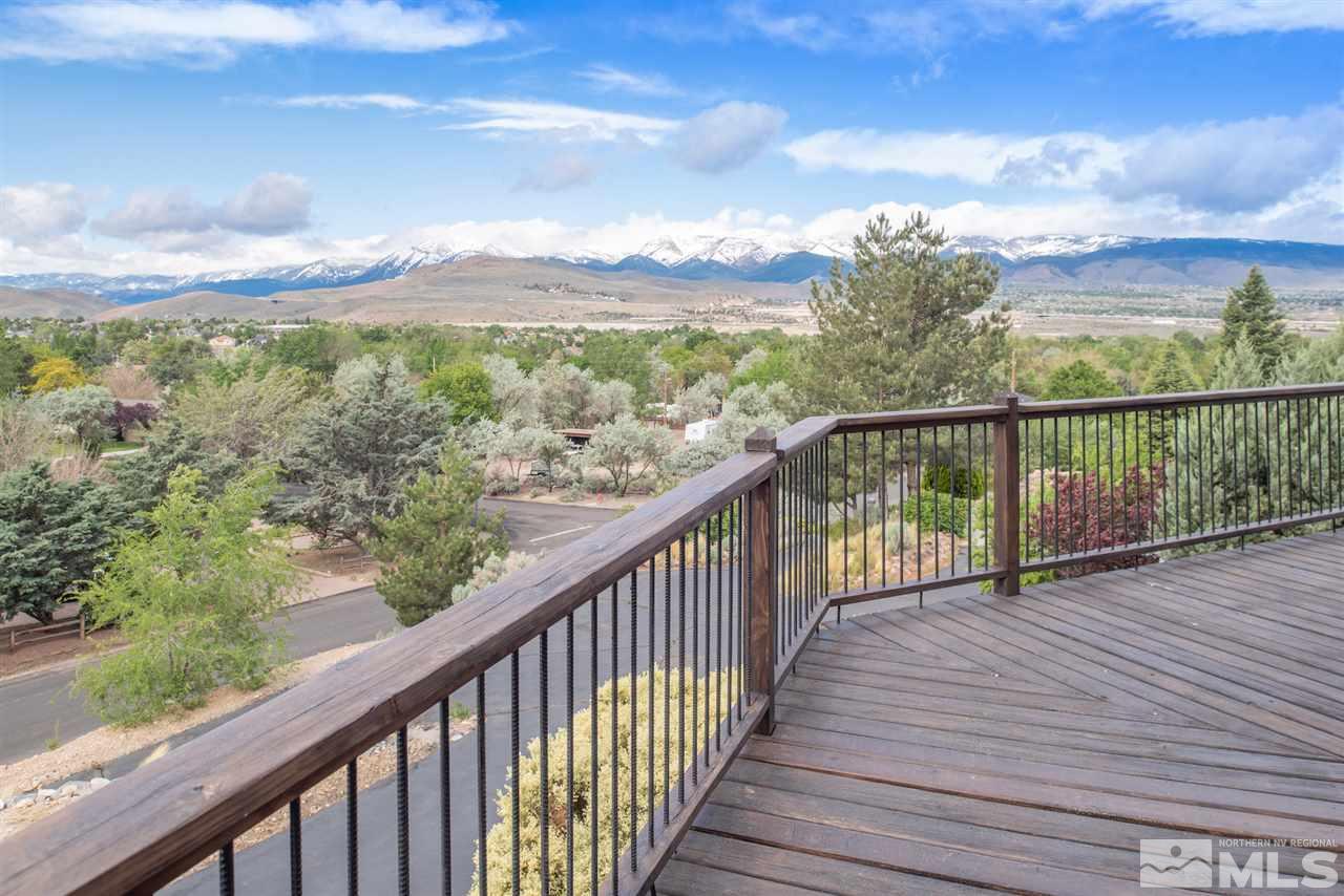 15505 Minnetonka Circle Reno, NV 89521 - Photo 20 of 25 a view of a balcony with wooden fence