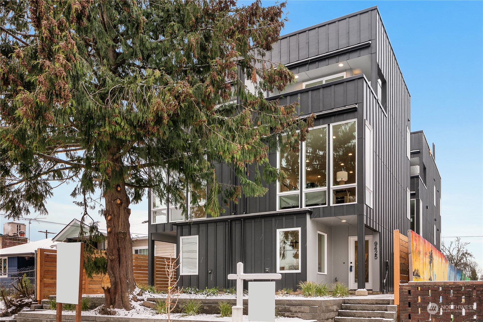 a front view of a building with street view