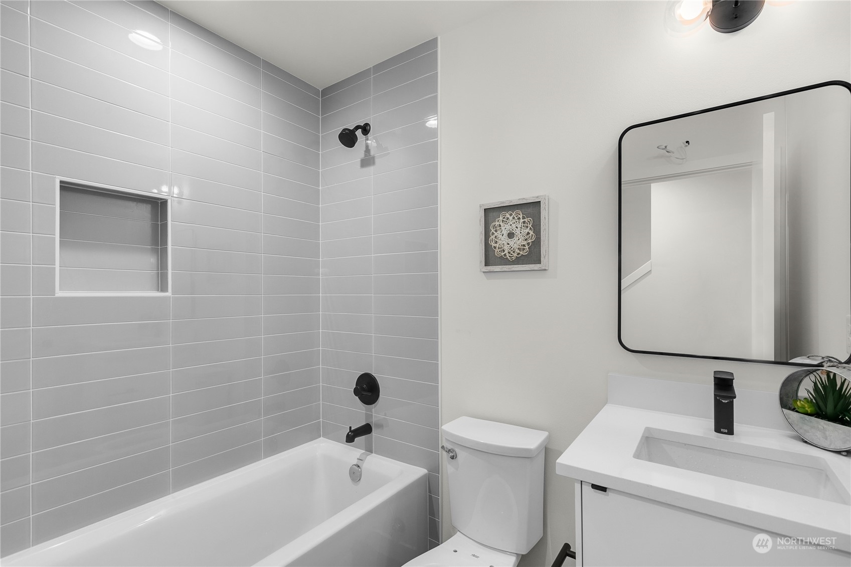 9429 18th Avenue Southwest, Unit B Seattle, WA 98106 - Photo 19 of 28 a bathroom with a toilet sink and shower