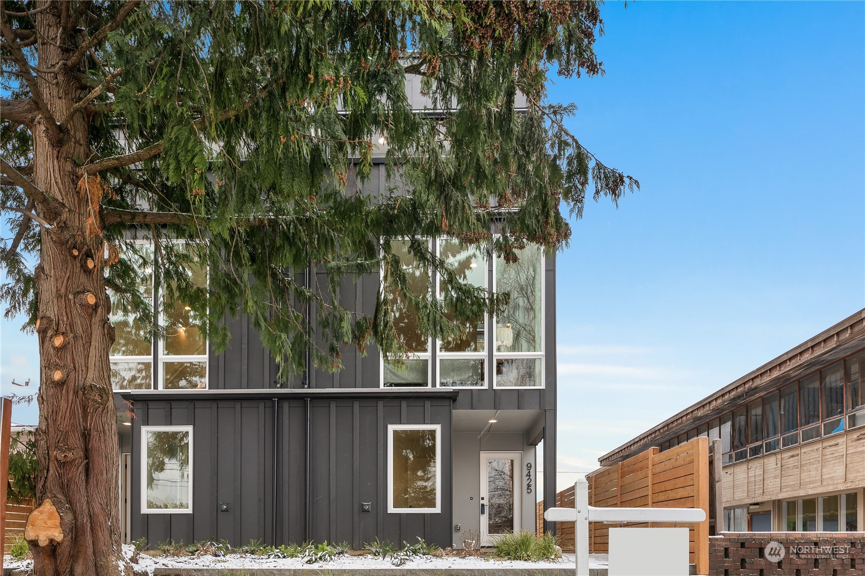 9429 18th Avenue Southwest, Unit B Seattle, WA 98106 - Photo 2 of 28 front view of a house with a tree