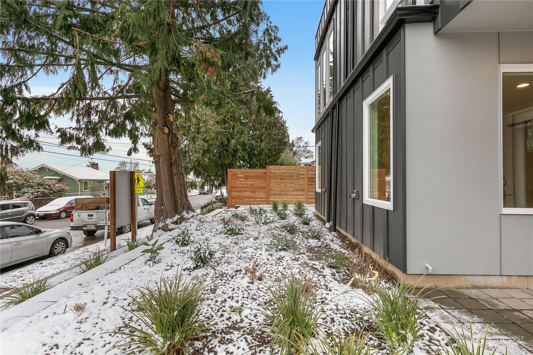 9429 18th Avenue Southwest, Unit B Seattle, WA 98106 - Photo 24 of 28 a backyard of a house with lots of green space