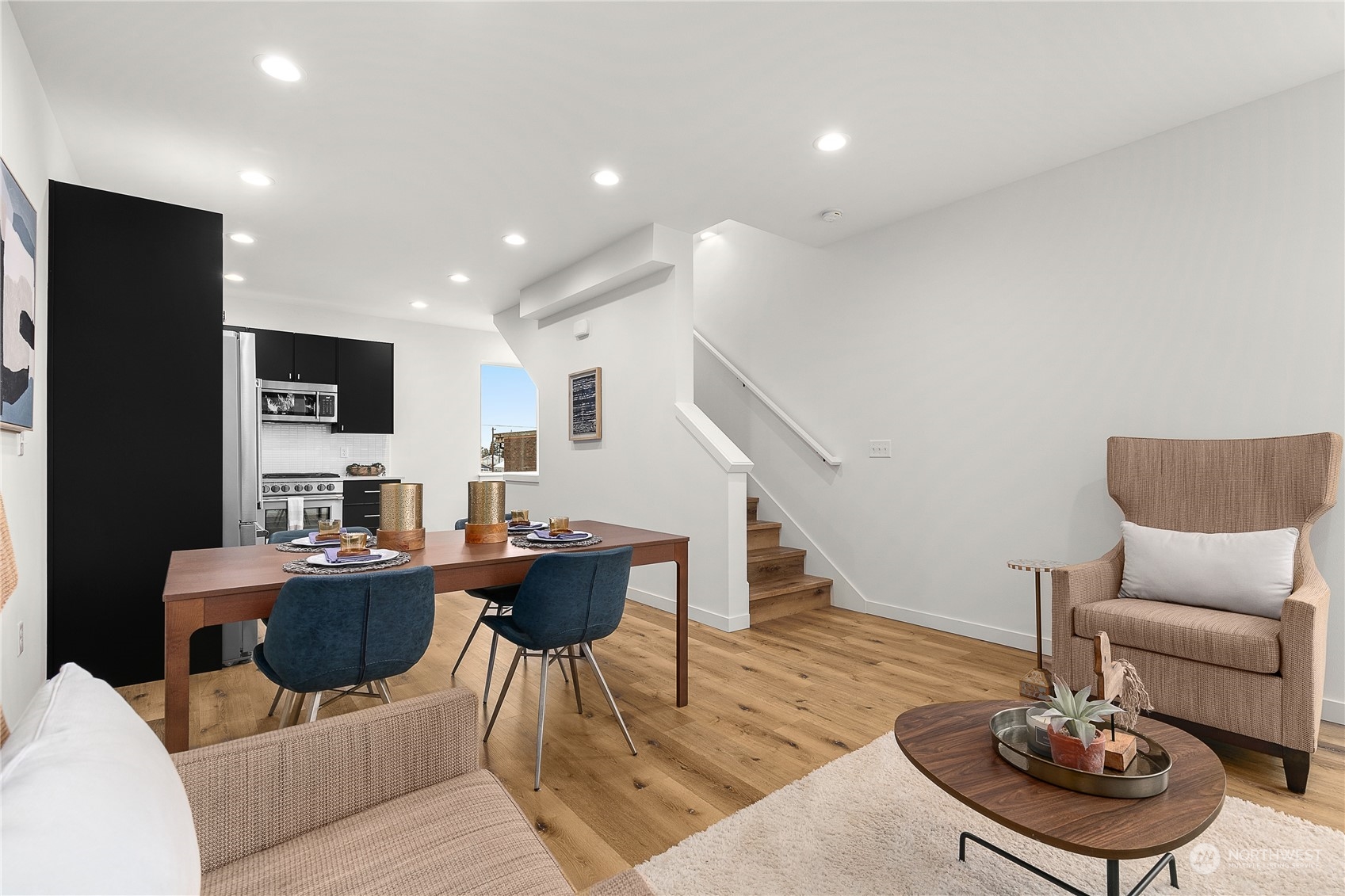 9429 18th Avenue Southwest, Unit B Seattle, WA 98106 - Photo 7 of 28 a living room with furniture and wooden floor